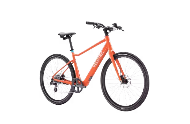Velotric T1 ST Plus Light Step-Over Fitness Electric Bike finished in Lava: side-front view